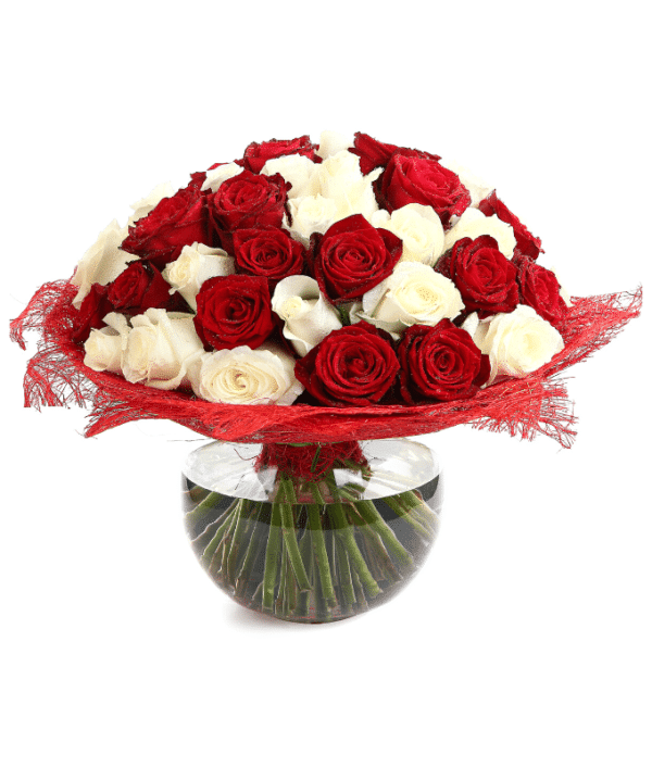 Arrangement of Red and White Roses in Glass Vase