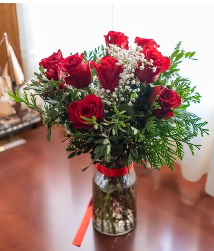 Beautiful Red Roses in Glass Vase