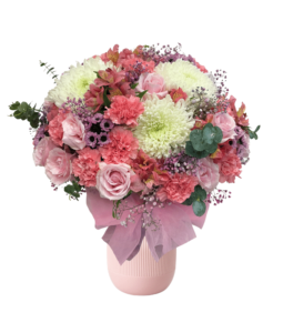 pink roses,light pink carnations,purple dotted chrysanthemums,white disbuds,pink astromeria,eucalyptus leaves in vase